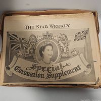 Top view of The Star Weekly Special Coronation Supplement newspaper showing Queen Elizabeth II portrait and dated June 13, 1953.