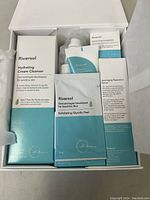 Open box view showing all Riversol skin care items in original packaging.