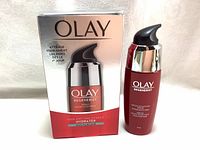 Photo showing one bottle and its box of Olay Regenerist Micro-Sculpting Serum, fragrance free moisturizer, 1.7 oz.