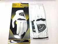New white Callaway Xtreme 365 golf glove for men, left hand, size ML, shown both in packaging and out of package.