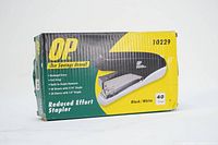 Box of OP brand Reduced Effort stapler showing product name, features, and specifications.