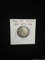 Obverse side of the 1906 silver one shilling coin showing King Edward VII's portrait and inscription.