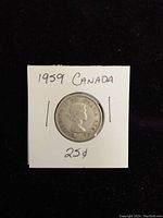Obverse side of the 1959 Canadian silver quarter coin showing Queen Elizabeth II, in a white 2x2 holder labeled with year, country, and denomination.