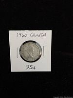 Obverse side showing Queen Elizabeth II portrait with inscriptions.