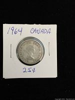 Obverse side of the 1964 Canadian silver quarter, showing Queen Elizabeth II's portrait.