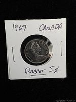 Obverse side showing Queen Elizabeth II portrait with inscriptions.