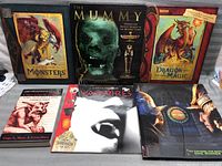 Photo showing the full set of six books arranged side by side