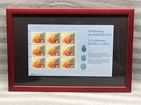 Framed sheet of 12 Canadian commemorative stamps celebrating the Queen Mother's 100th birthday.
