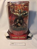 Front view of Frazetta's Berserker figure in original packaging showing figure and packaging damage.
