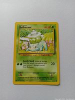 Original Bulbasaur Base Set Pokémon card front showing artwork and game information.