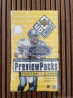 Front view of sealed 1998 NFL Upper Deck Choice Series One Preview Pack football card box featuring Troy Aikman and information about card count and packs.