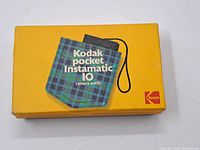 Original yellow Kodak Pocket Instamatic 10 box with plaid pocket design