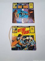 Photo showing both Batman and Star Trek book and record sets side by side, front covers visible.