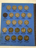 Two-page coin album showing multiple Jefferson Nickels from 1938 to 1961-D with mint mark and mintage information, 5 coins missing.