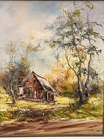 Close-up of the detailed oil painting showing wooden cabin, trees, and dirt road in warm autumnal tones.