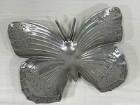 Full view of butterfly shaped pewter finish platter showing overall shape and size