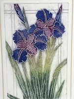 Close-up of the colored etching showing iris flowers in blue, purple, and green, with white outlines and a simple background.