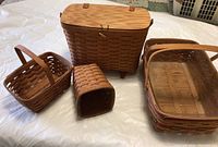 Overview photo showing all four baskets arranged together on a white surface