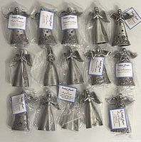 Twenty pewter Faithful Angels figurines, mostly new in original packaging, shown together, different poses and designs with labels.