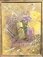 Close-up of signed abstract acrylic painting with a dynamic arrangement of varied brush strokes and splatters on a golden background, showing detail and signature on lower right corner.