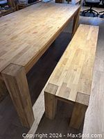 Table corner and bench detail showing block joinery and finish