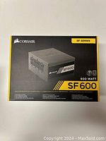 Front of box showing Corsair SF600 SFX 600W power supply