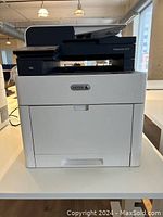 Front view of Xerox WorkCentre 6515 printer on desk