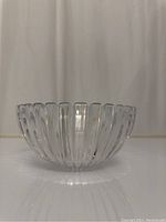 Clear side view of Tiffany & Company crystal bowl showing vertical cut pattern.