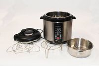 GoWise large capacity stainless steel pressure cooker with detachable lid, inner pot, and metal racks