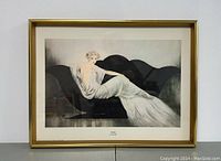 Frontal view of framed lithograph showing full composition and gold-tone frame.