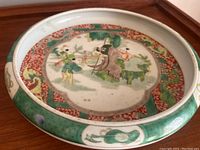 Top view of the round washer on wooden surface showing full interior decoration and shape