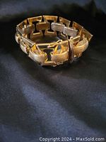 Bracelet folded to show link design and clasp