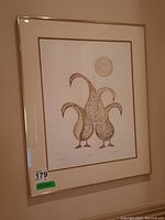 Framed limited edition signed Bird Dance print by Isaac Bignell with signature and edition number visible.