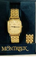 Front view of Montreux wristwatch in original box showing watch face and one set of extra strap links