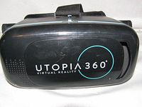 Front side of the black Utopia 360° VR headset showing the logo and design.