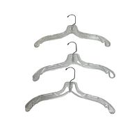 Three clear plastic clothes hangers with metal hooks, shown side by side to display shape and material.