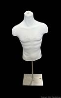 Front view of white men's half body mannequin torso on metal stand, showing upper chest and abdomen with detailed musculature.