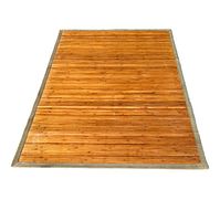 Top-down view of bamboo floor mat showing full rectangular layout with fabric border.