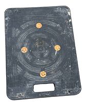 Top view of rectangular black plastic platform with circular textured pattern and handle cutout.