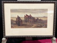 Framed heliogravure print showing the full artwork and surrounding frame with decorative edges.