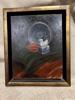 Frontal view of the signed oil on copper painting in a gilded frame.