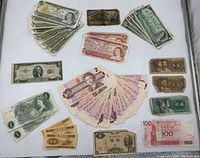 Overview of entire lot displayed flat on white surface