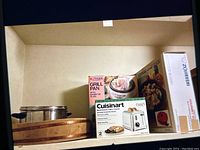 Photo of all items including Cuisinart toaster box, Tiger grill pan box, Zojirushi gourmet sizzler box, and kitchen tools including cutting boards.