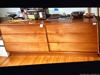 Full front view of the six-drawer dresser showing overall appearance and finish