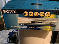 Photo of the Sony SLV-N750 VCR box showing branding and product image