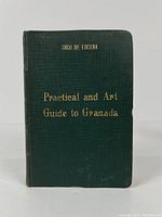 Front cover of the green textured hardcover book with gold embossed title.