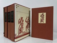 Four volumes of The Complete Greek Tragedies in rust-colored hardcovers housed in a cream slipcase with Greek warrior design.