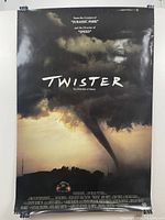 Front view of the Twister movie poster showing tornado image and title.