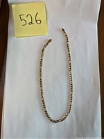 Full view of chain laid out next to lot identifier