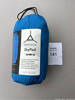 Blue Tentsile SkyPad camping pad in carrying bag with product details and materials